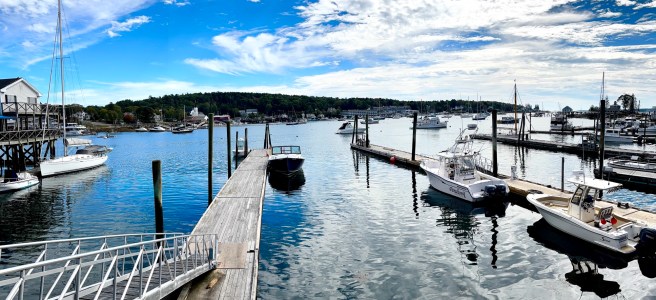 View of boats, water and sky in Boothbay, Maine.