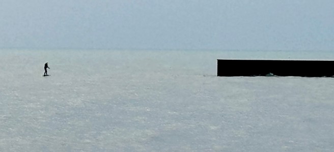 Lone person using a foil board on Lake Michigan